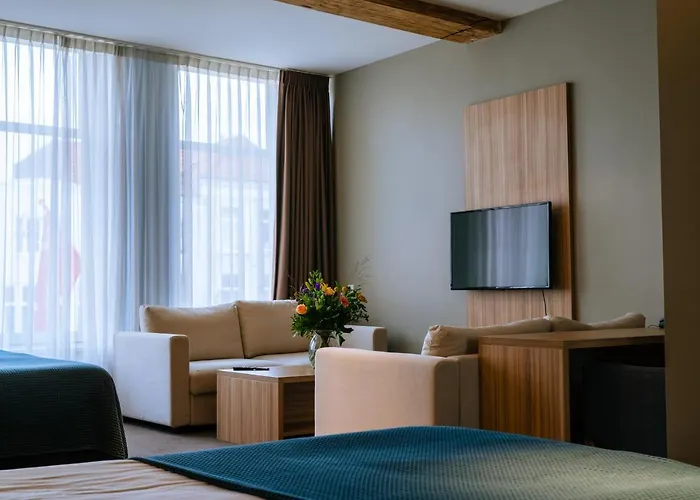 호텔 Stadshotel De Klok 3*