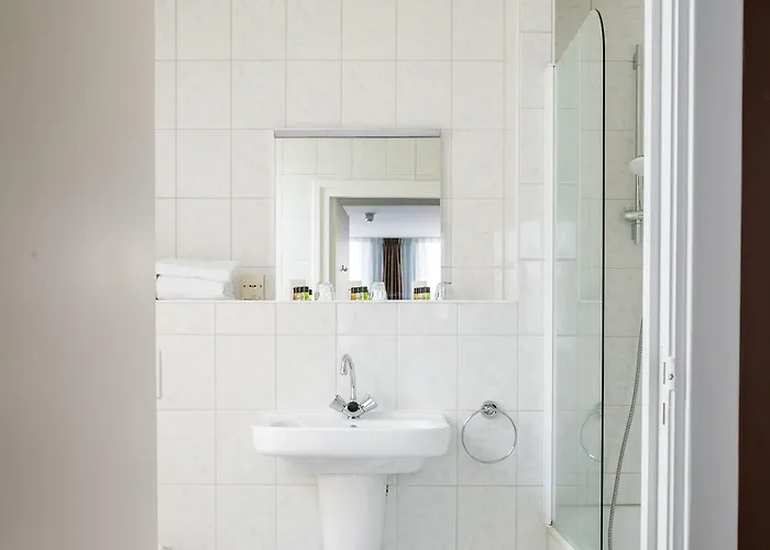 Stadshotel De Klok 호텔 3*